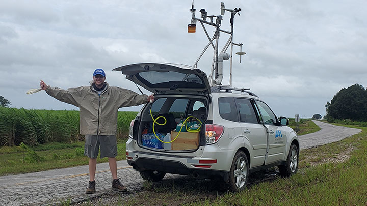 photo of student with uah weather tracker