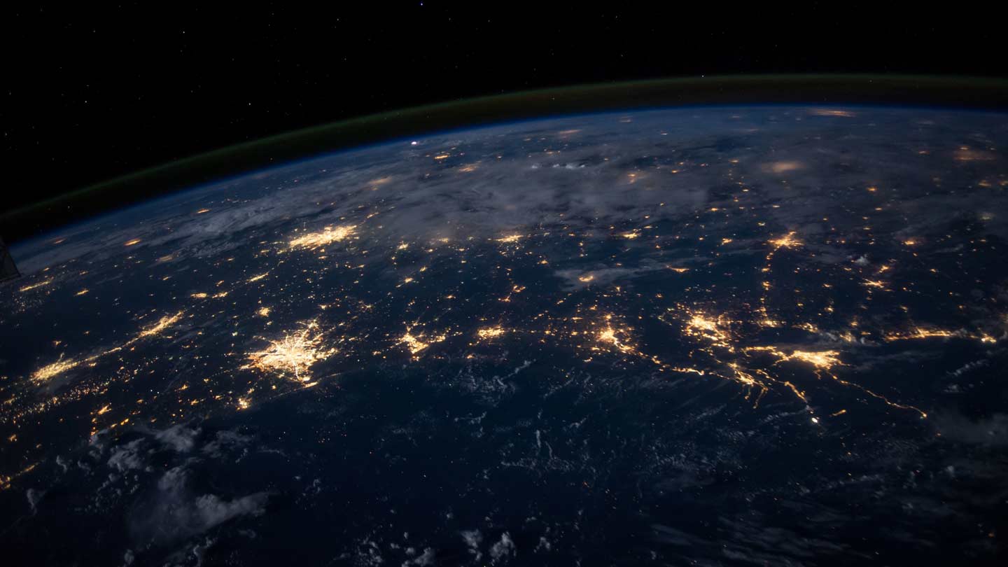 Earth from space showing city lights.