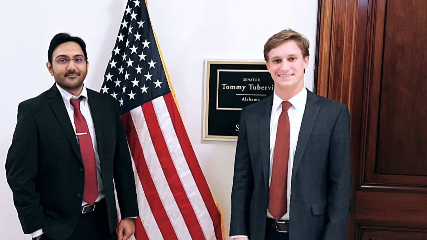 Dixit (left) with Rusk Henry legislative correspondent in Senator Tommy Tuberville’s office (right)