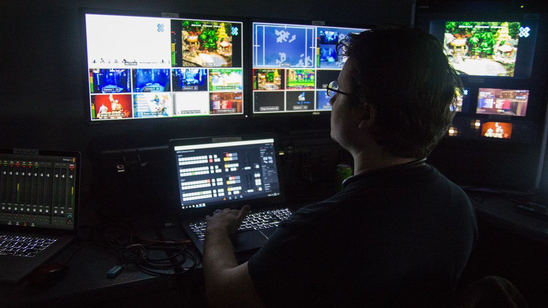 someone examines monitors