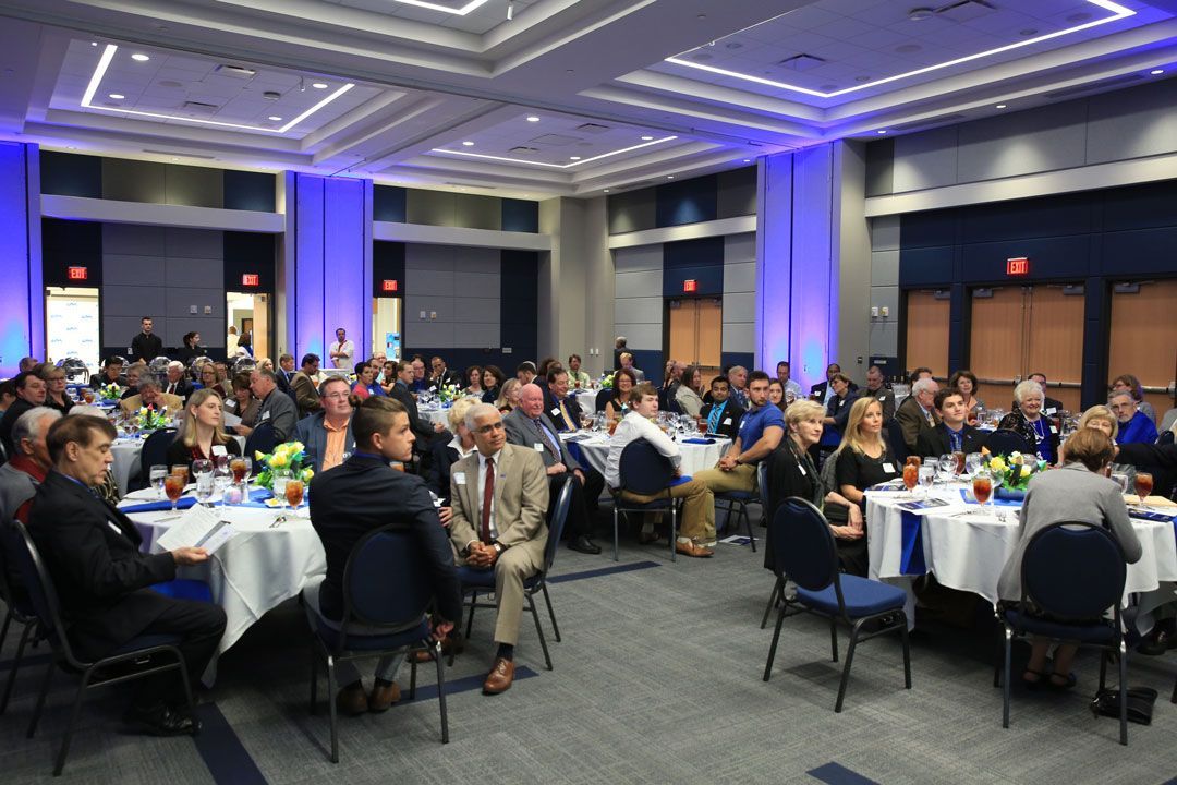 a ballroom full of people