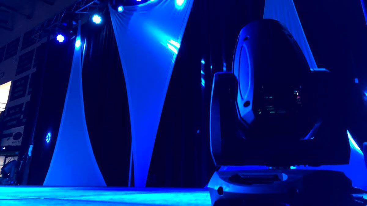 stage lighting glows blue