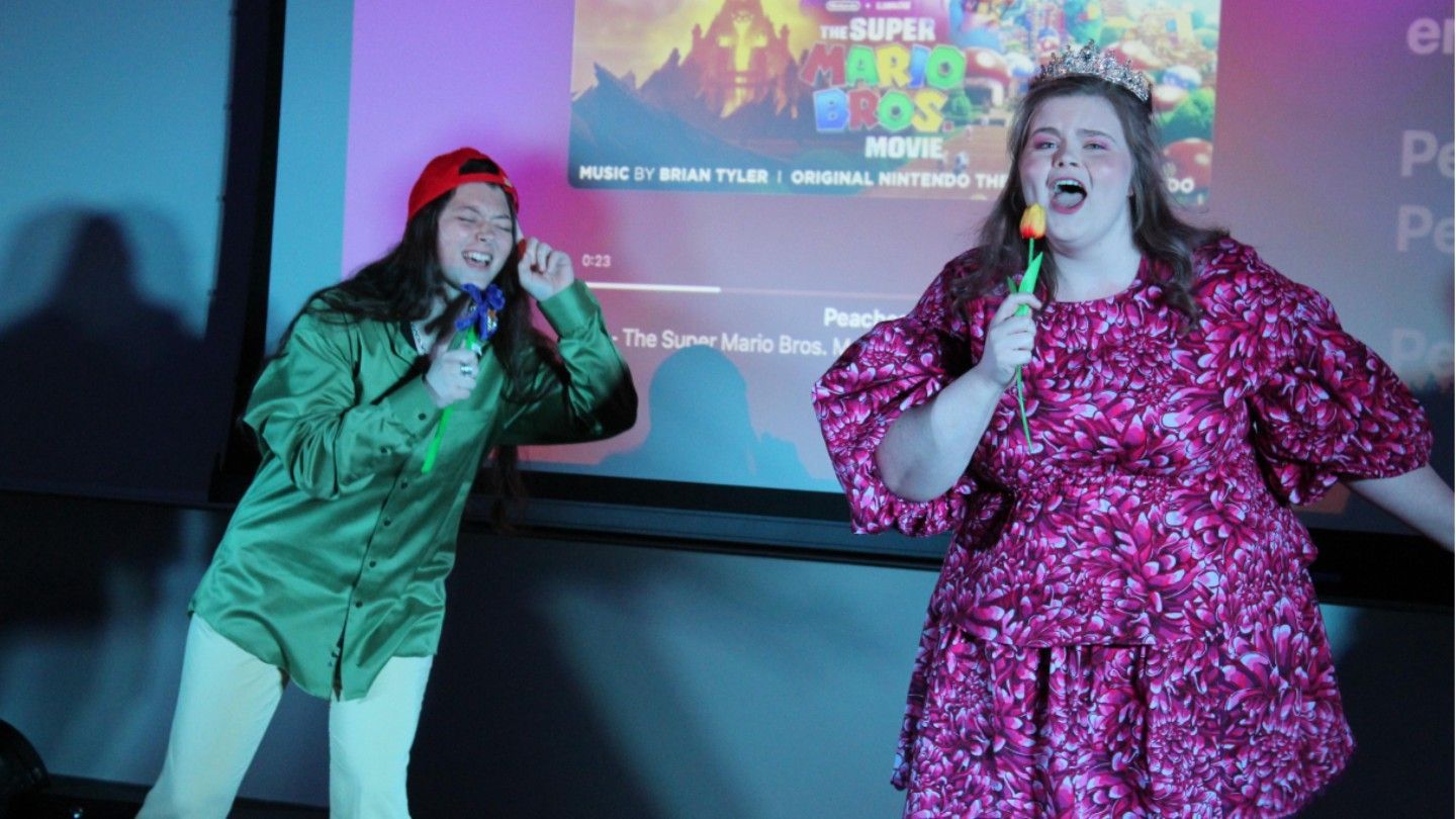 two honors women sing karaoke