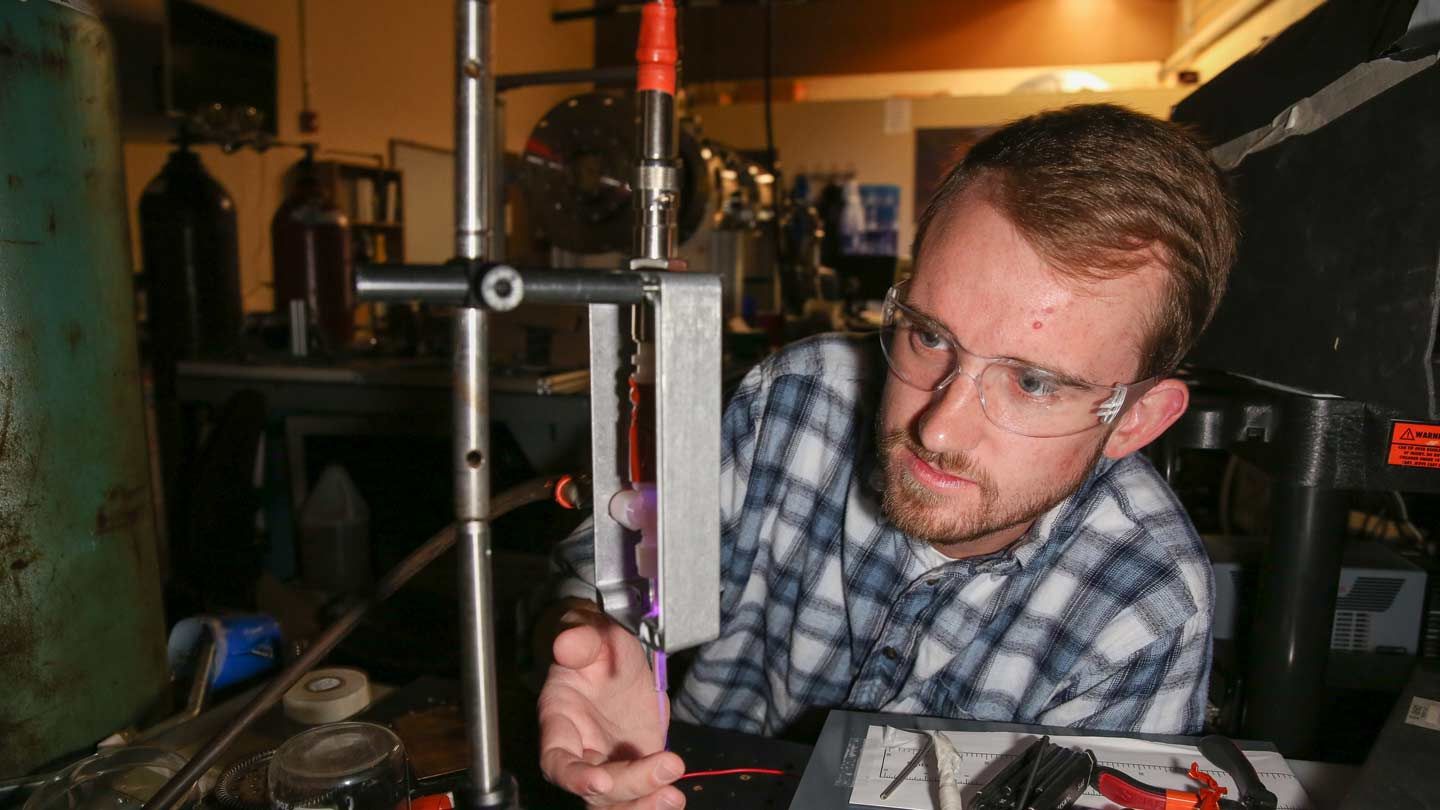 Man handles an apparatus