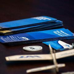 Photography example of trifolds, glider, and other merch
