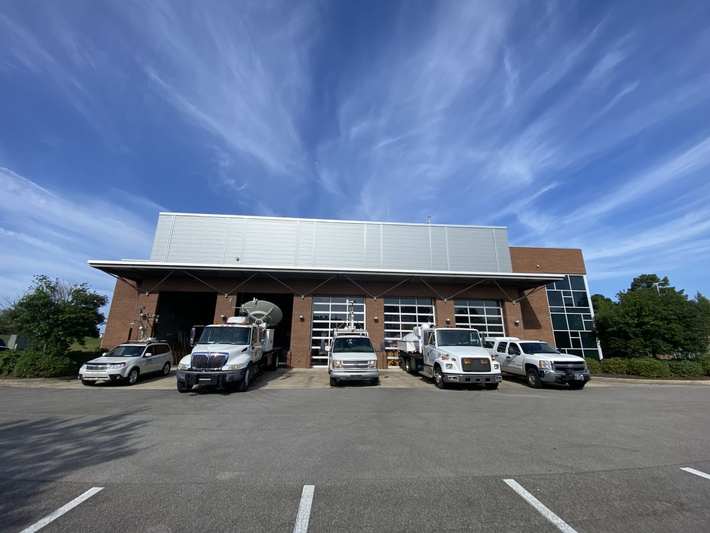 Mobile weather instruments parked in the Severe Weather Institute - Radar & Lightning Laboratories garage.