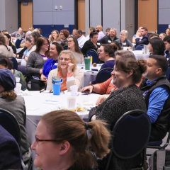 Attendees enjoy a hot breakfast as the conference begins.