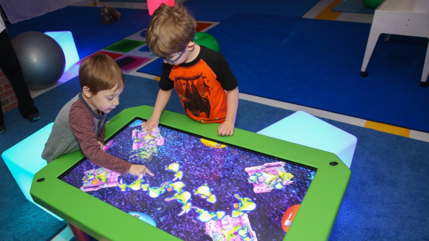 Children play with a sensory toy