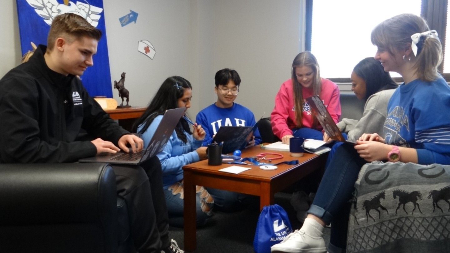 Living Learning Community Students work around a table
