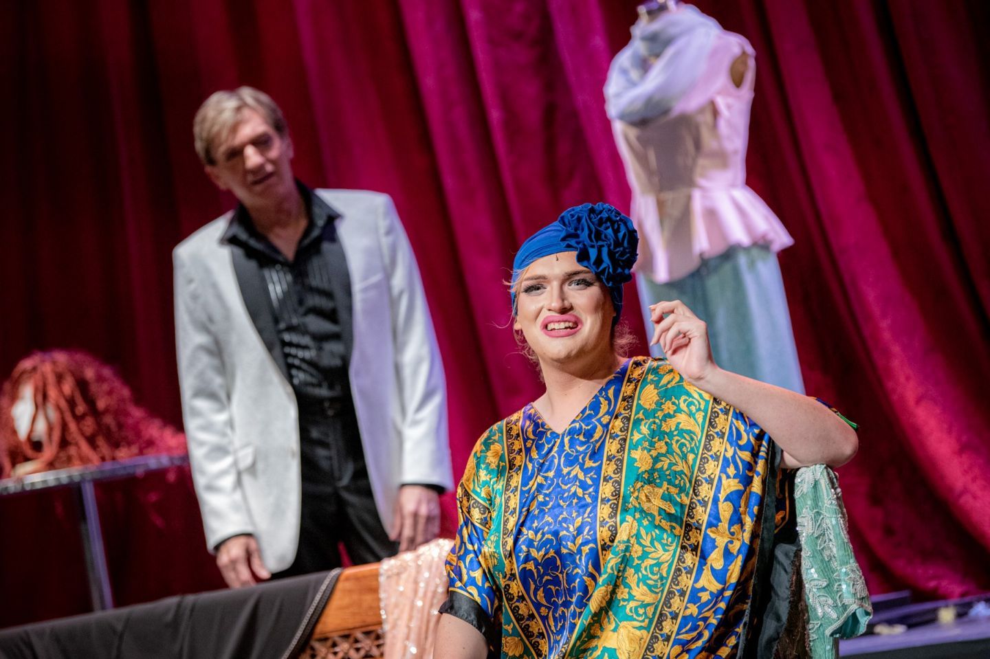 actors in full costume in the middle of a performance.
