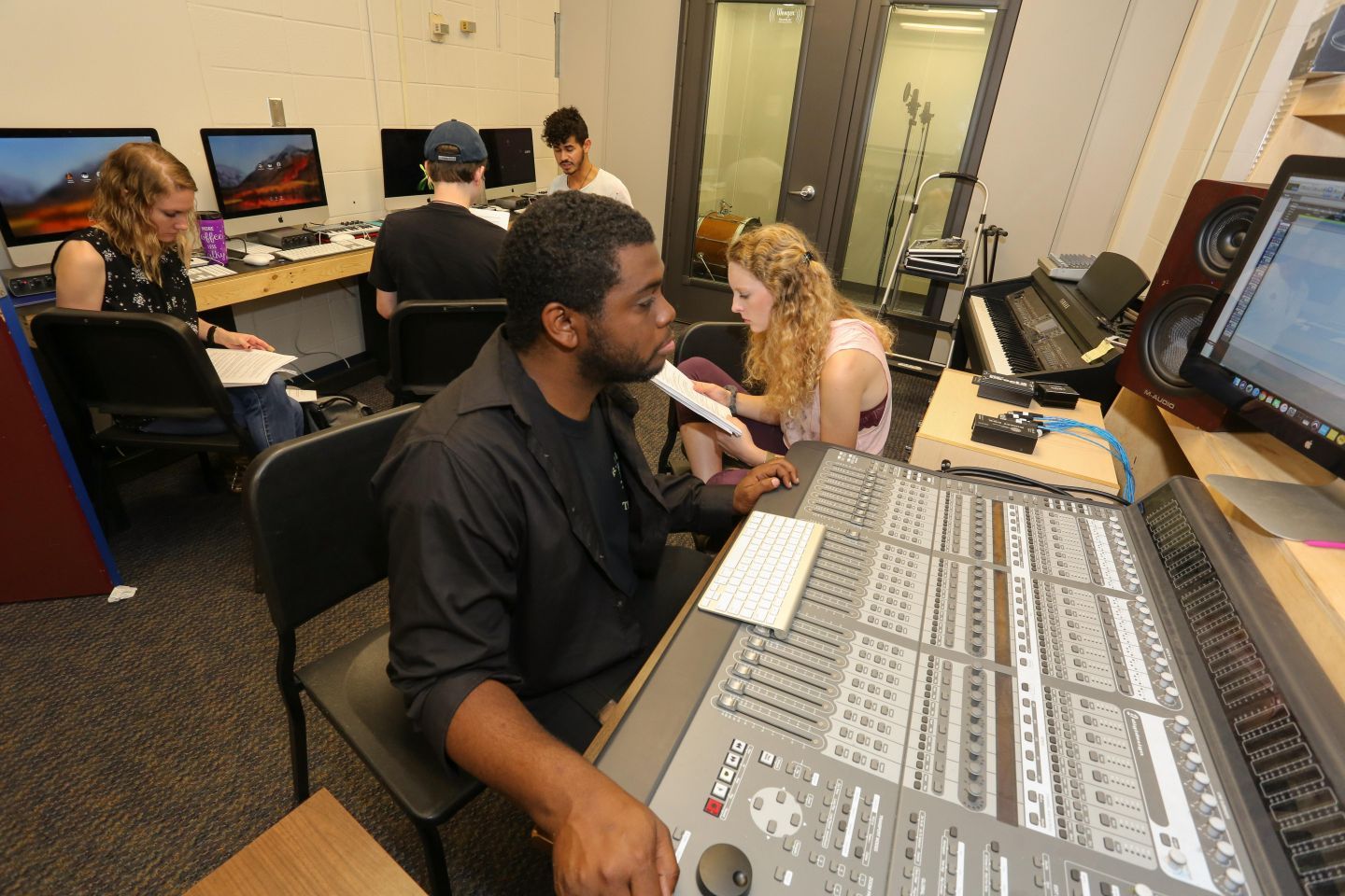 a man uses a soundboard