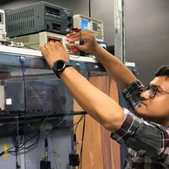 U A H student Nabil Hoque working on a thermal noise-limited fiber sensor