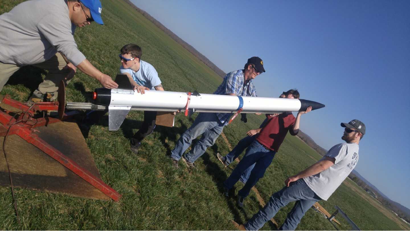 students prepare to fire a rocket