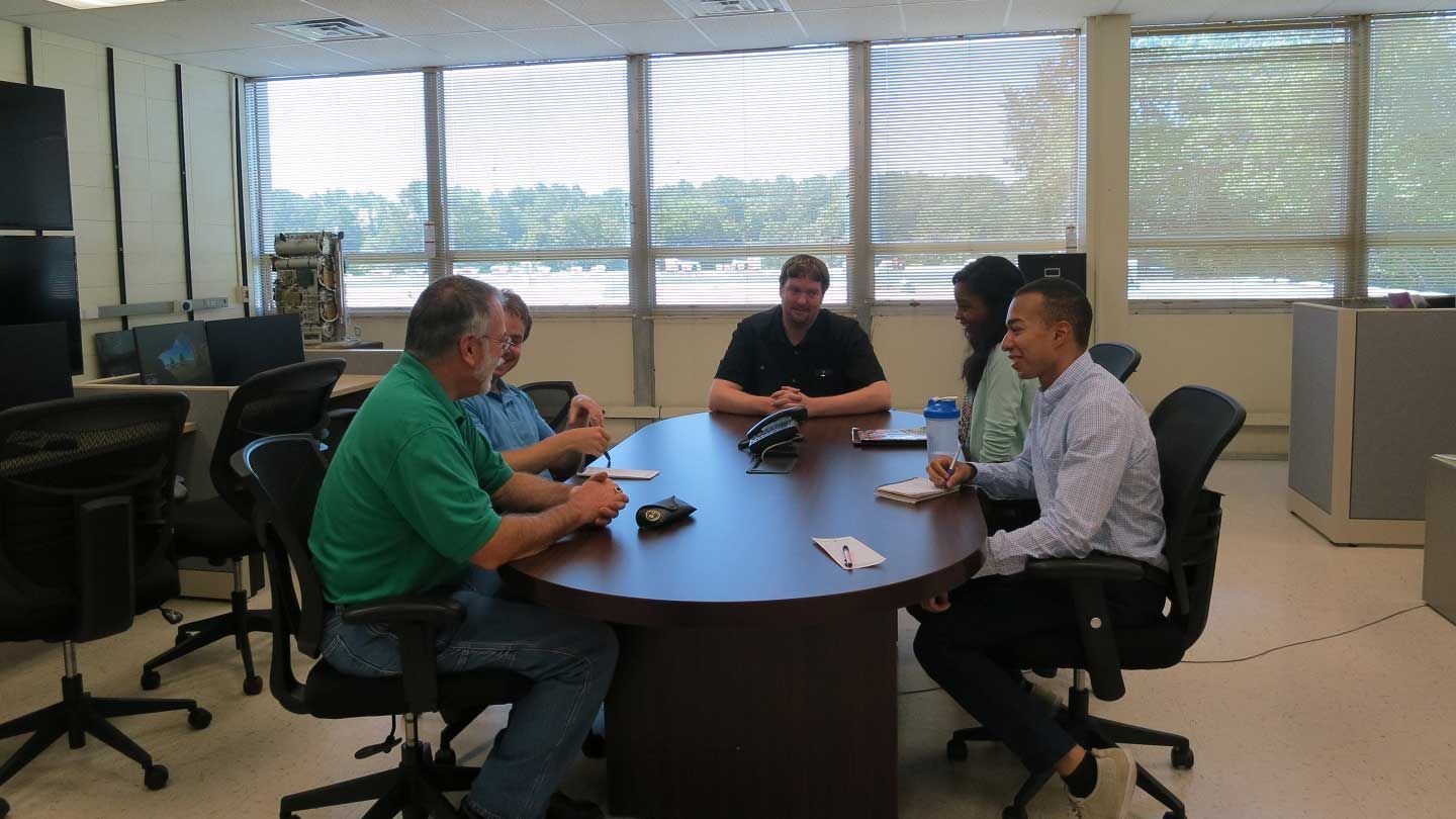 a team holds a discussion