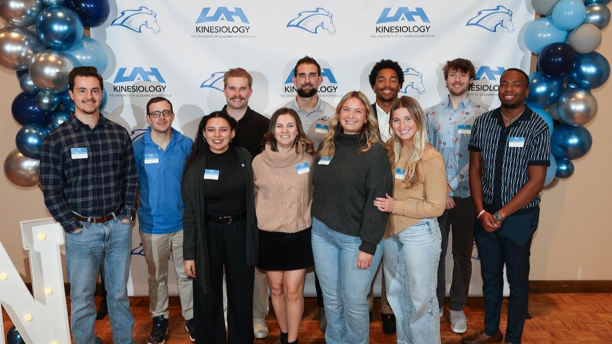 Kinesiology interns stand together
