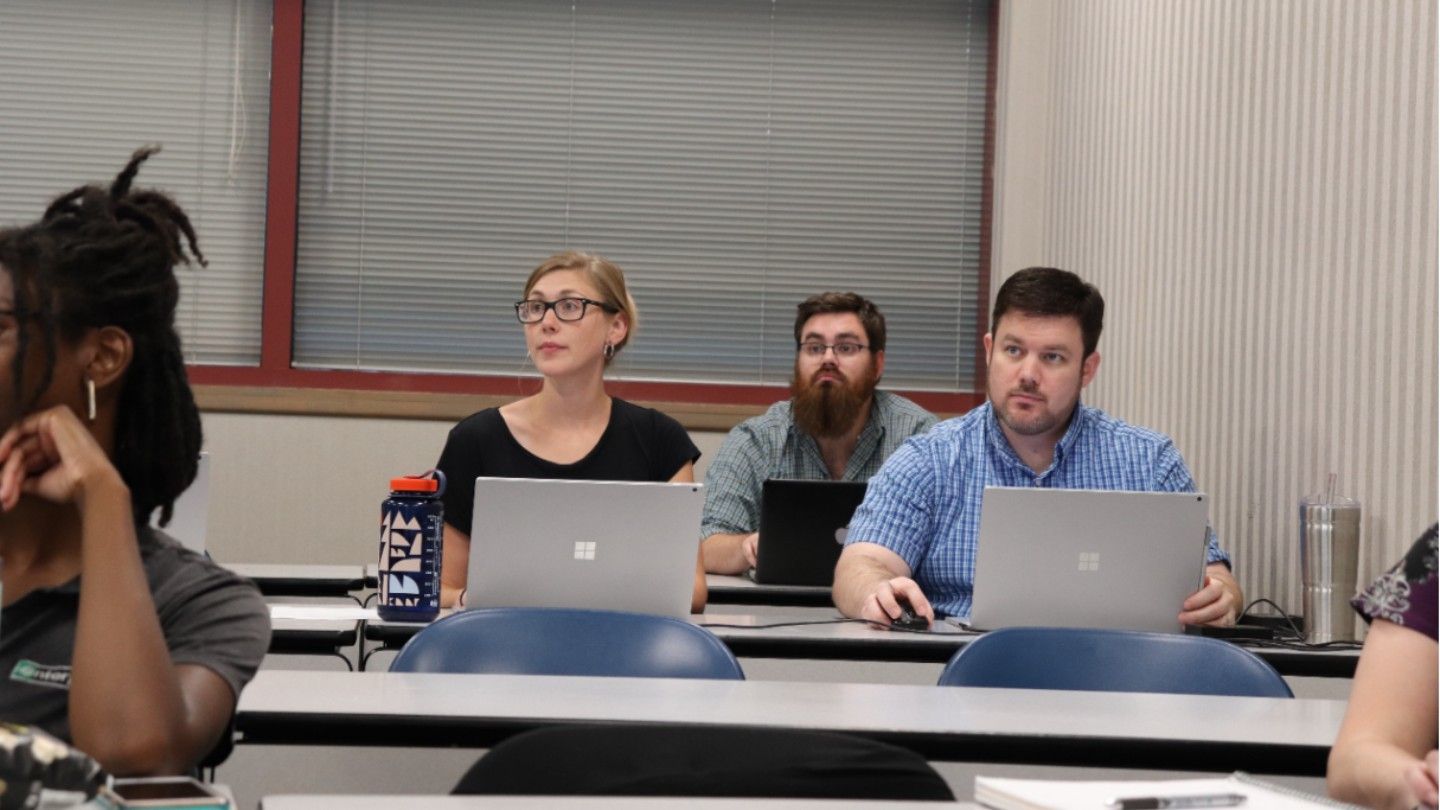 students listen earnestly