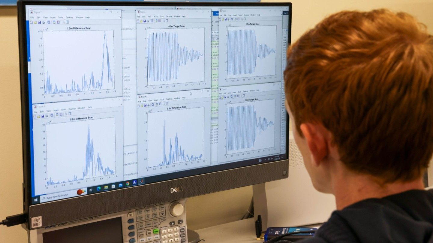 a man examines data