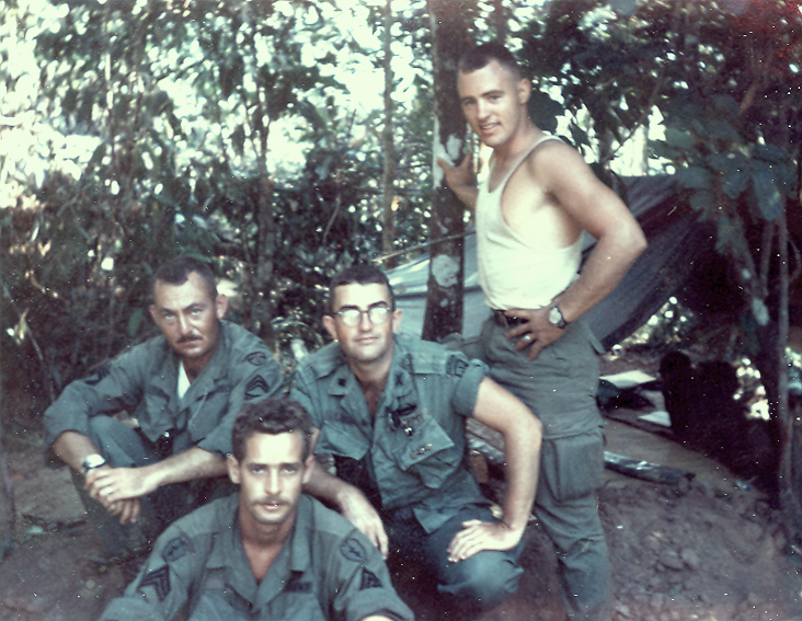 Cliff Lanham (kneeling, right) and his adviser team somewhere in War Zone C near Souri Tri, east of TayNinh III Corps, South Vietman, 1968