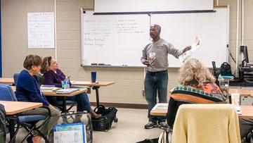 OLLI at UAH instructor, Elliott Miller, teaching during his Monday morning Seven Painting Principles course.