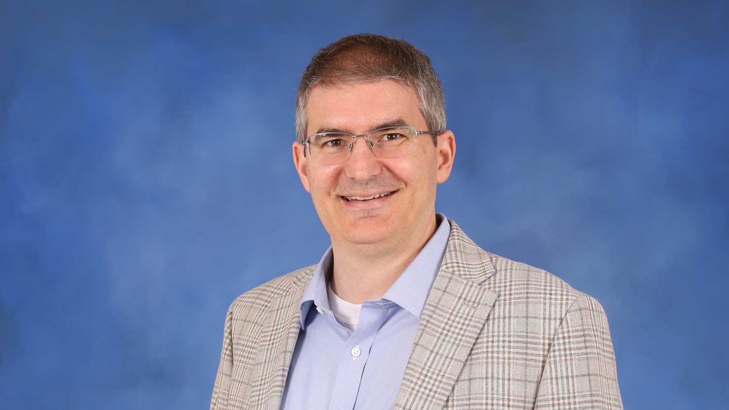 Dr. Greg Bacon