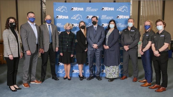 From left to right, UAH Development Officer, Jennifer Brost, UAH Athletic Director, Cade Smith, UAH President, Dr. Darren Dawson, UAH Provost and Vice-President of Academic Affairs, Dr. Christine Curtis, April Schonrock, Keith Schonrock III, Heather Shonrock, UAH Hockey Coach, Lance West, UAH hockey players Connor Wood and Bauer Neudecker.
