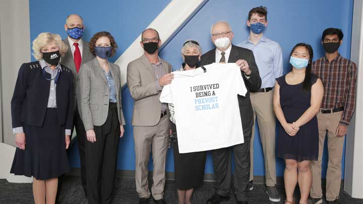 From left to right are UAH Provost Christine Curtis, UAH President Darren Dawson, Vice President for University Advancement/Executive Director of UAH Foundation Mallie Hale, Honors College Dean Dr. William Wilkerson, Linda Wallace, Stanley E. Provost, Trevor Garnett, Tiffany Dinh and Anjan Naranaswamy.