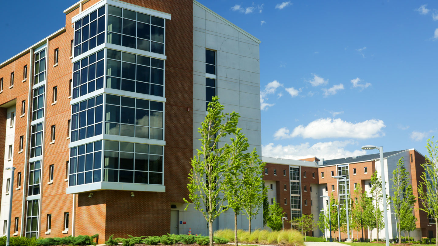 the exterior and landscaping of charger village addition residence hall at uah