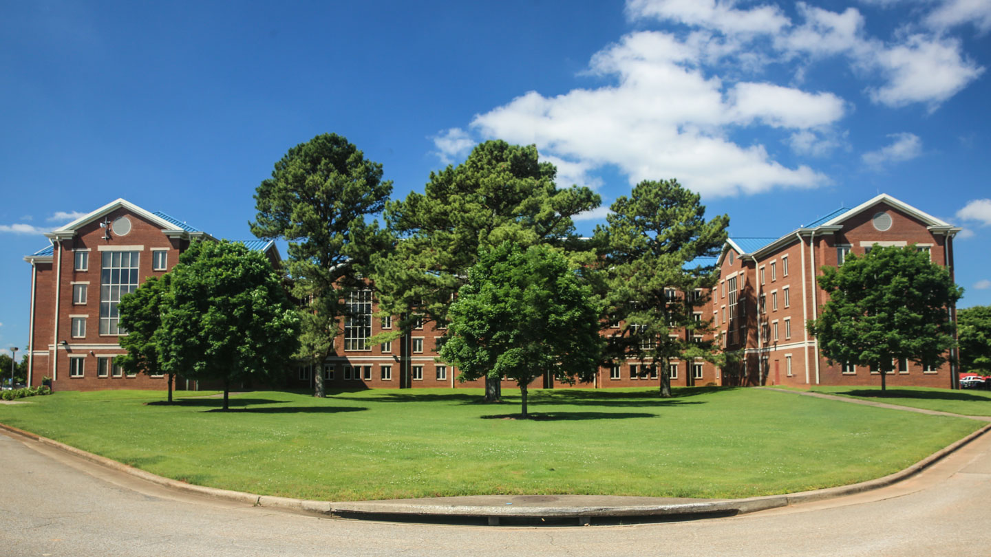 the exterior and landscaping of north campus residence hall at uah