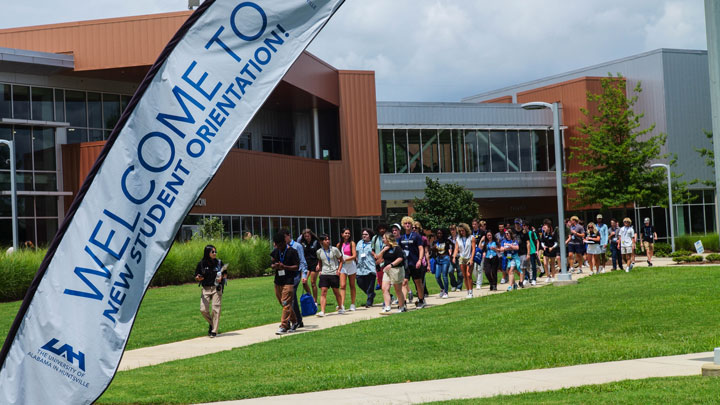 Group from summer 2023 leaves Charger Union for a campus tour.