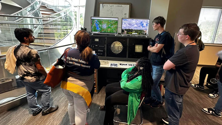 UAH engineering students racing a concrete canoe on the Bayou St. John in the 37th annual American Society of Civil Engineers