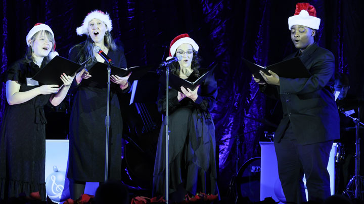 The UAH Vocal Jazz Ensemble – Dr. Amalia Osuga, director; Faylee Crawford; Bonnie Price, and Jay Hendricks – sing “I’ll Be Home for Christmas” during Holiday Jazz on Dec. 10, 2024.