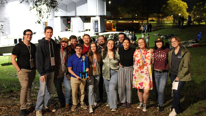 UAH engineering students racing a concrete canoe on the Bayou St. John in the 37th annual American Society of Civil Engineers