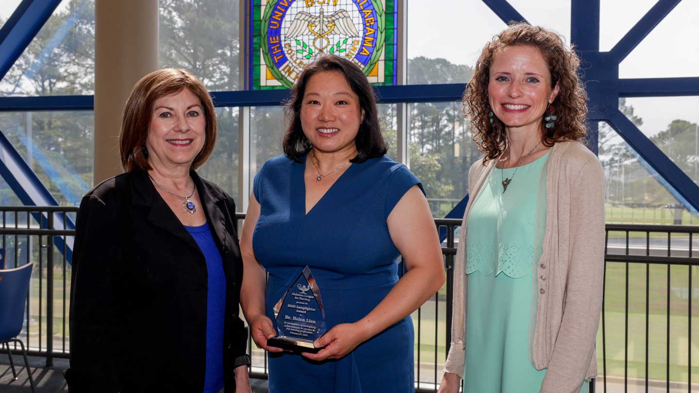 From left, Dr. Karen Frith, dean of the College of Nursing at The University of Alabama in Huntsville (UAH); award recipient Dr. Helen Lien, senior development officer for the College of Nursing, and Mallie Hale, UAH vice president for university advancement.