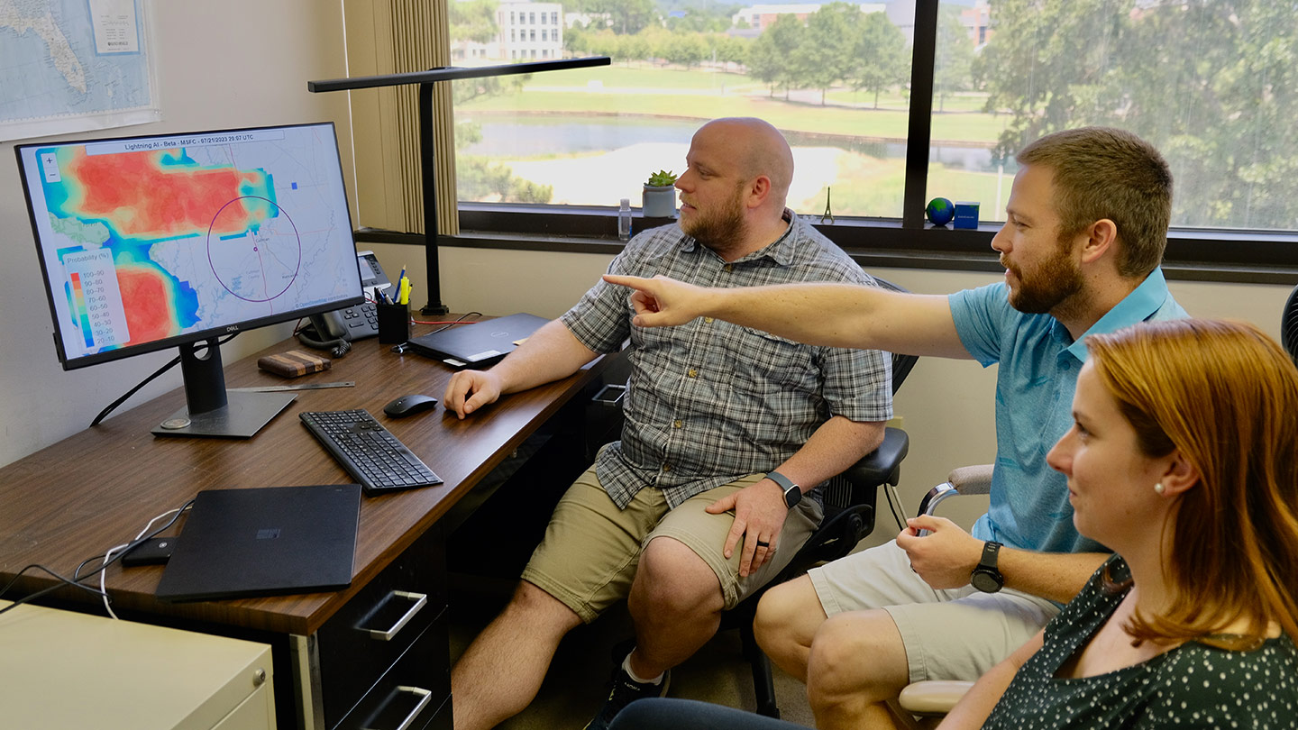 Dr. Robert Junod, Dr. Andrew White and Kelley Murphy