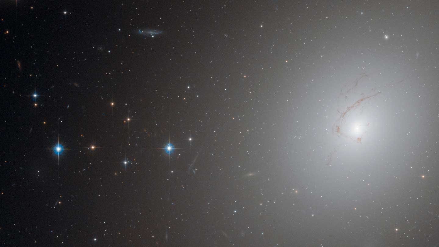 NGC 4696, a galaxy within the Centaurus galaxy cluster, 170 million miles from Earth.