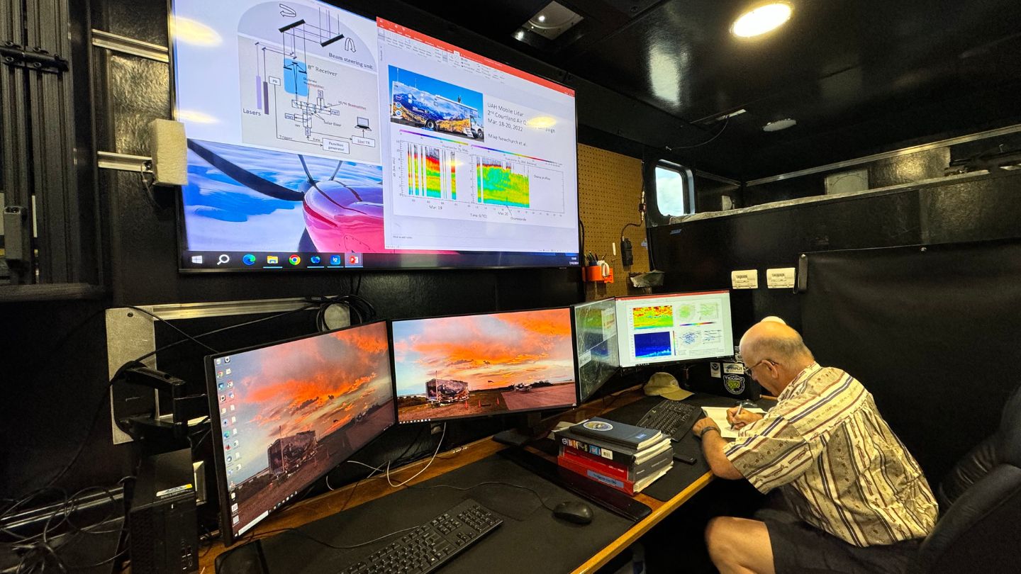 Dr. Newchurch inside RO3QET. RO3QET lidar is a Differential Absorption Lidar (DIAL) and one of the six systems of the Tropospheric Ozone Lidar Network