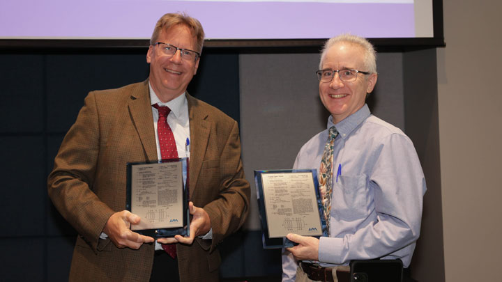 Robert Lindquist, left, and Patrick Reardon were recognized for Systems and Methods for Processing Optical Signals.