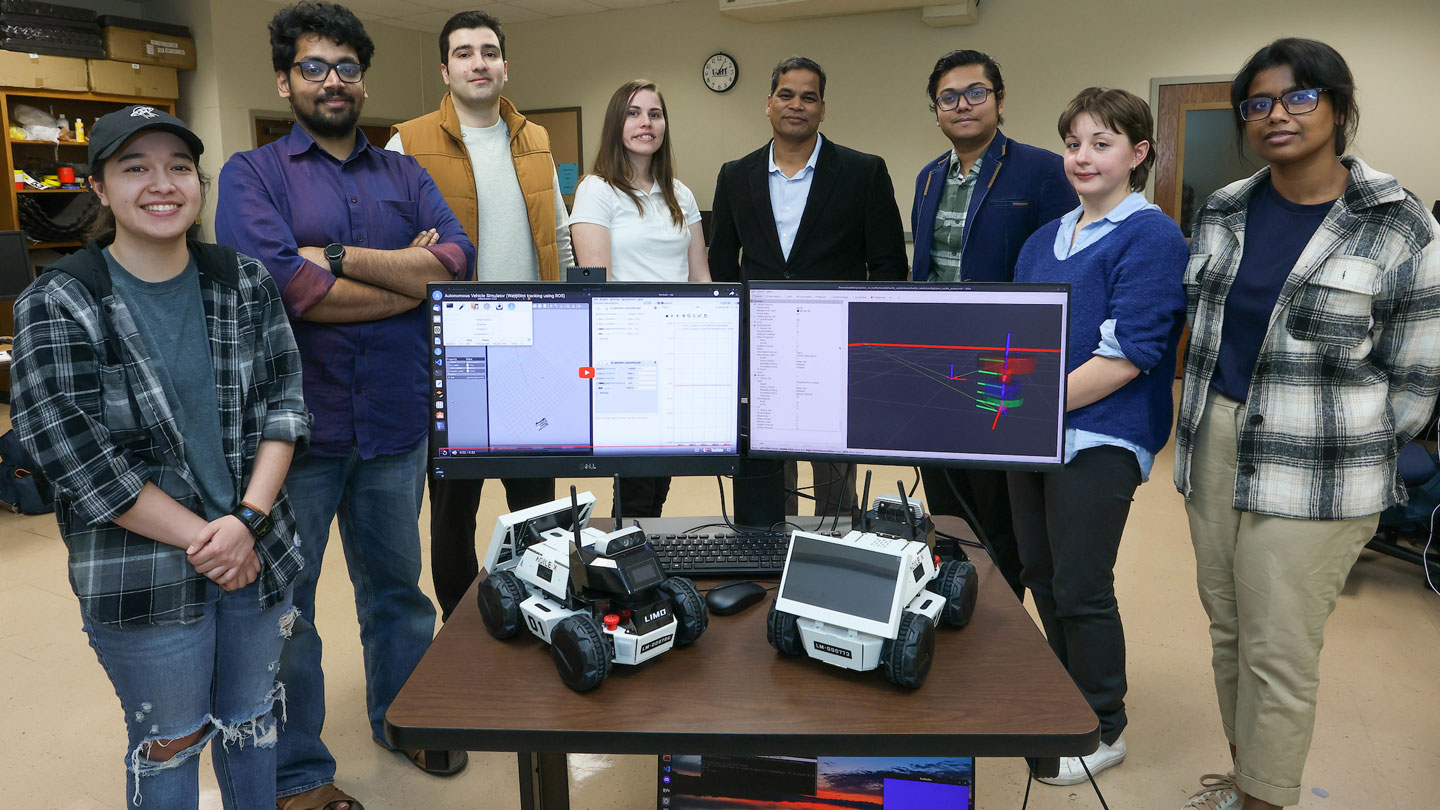 Dr. Avimanyu Sahoo, assistant professor of Electrical and Computer Engineering at UAH with his students in the Sahoo Lab. (L-R) Jessica Hamer, Mahican Door Shaman, Arial Yousefian, Tiffany Lodge, Avimanyu Sahoo, MD Sazzad hose, Sofia Lopez and Salma Alam. 