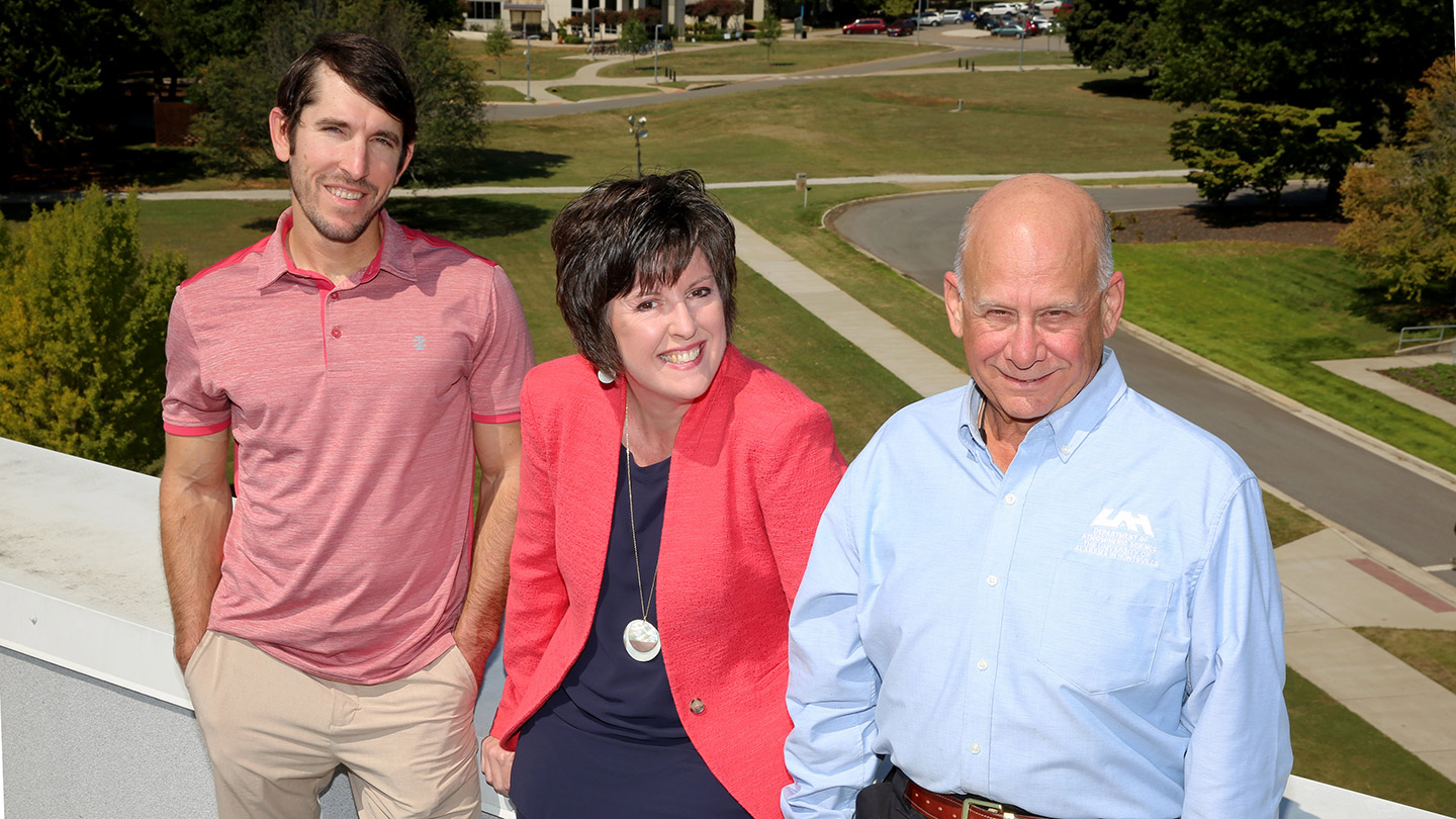 Dr. Aaron Naeger, Dr. Susan Alexander and Dr. Michael Newchurch, left to right