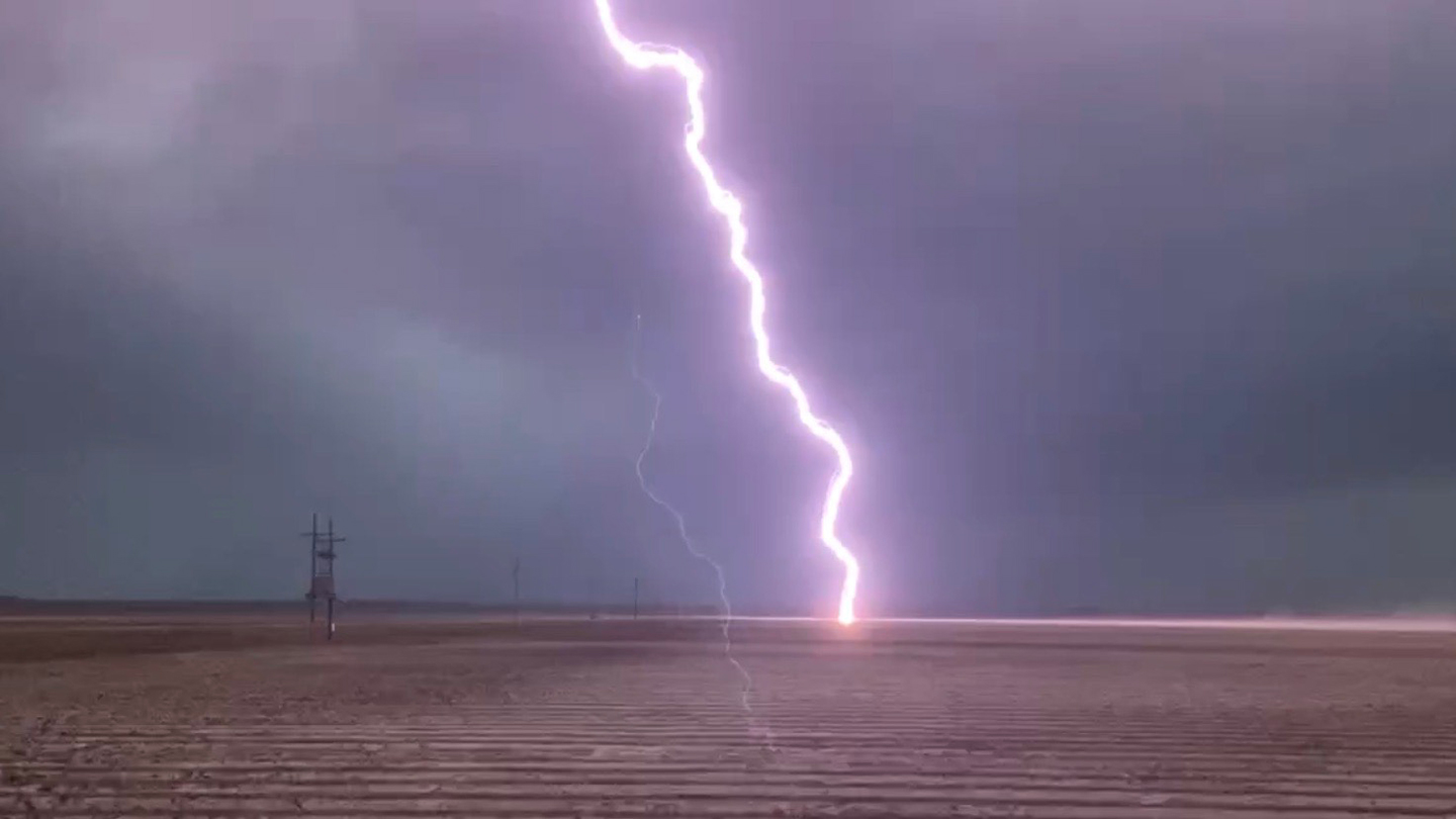 lightning striking an empty field