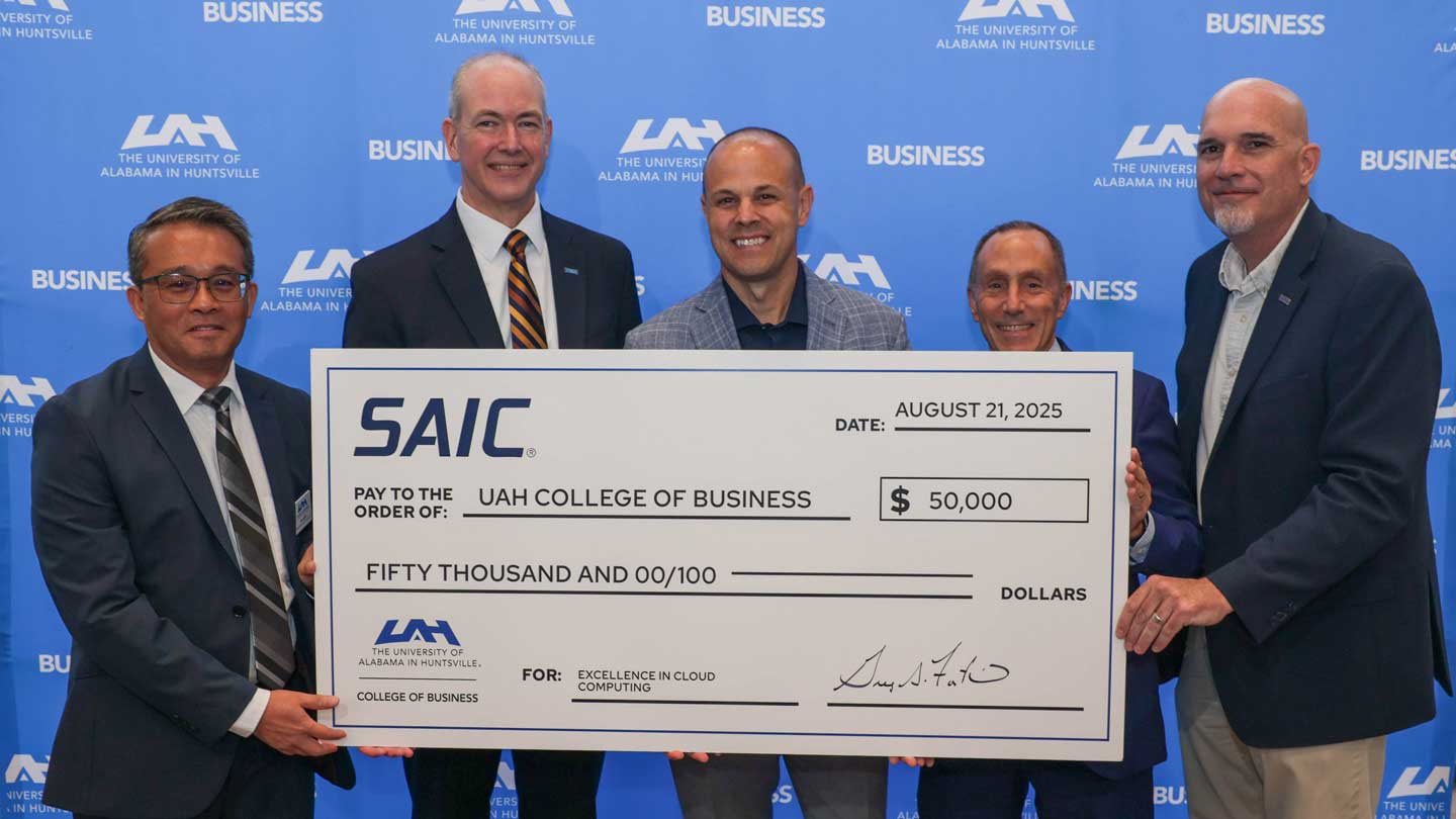 left to right, Dr. Wai Yin Mok, chair, Department of Information Systems, Supply Chain, and Analytics, College of Business; Dr. Jason Greene, dean, College of Business; Greg Fortier, senior vice president, SAIC Army Business Group; Dr. David Puleo, UAH provost, and Dr. Colby Jones, director of innovation, SAIC Chief Technology Office.
