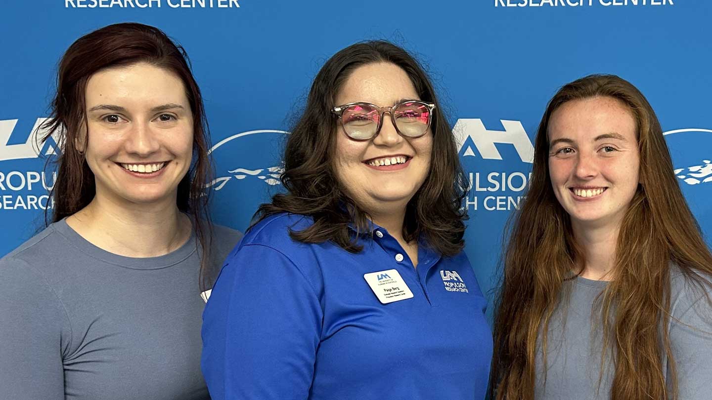 From left to right UAH Women In Defense Scholars, Dr. Michaela Hemming, Paige Berg and Olivia Williams.