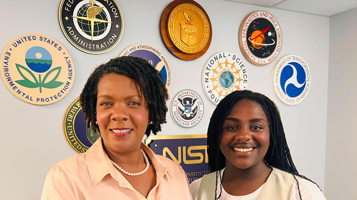 Capitol Scholar Kierra Thomas, right, receives a visit from Dr. Noelle Hunter, clinical assistant professor in the Department of Philosophy and Political Science