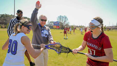 President Robert Altenkirch places the ball on a ceremonial draw