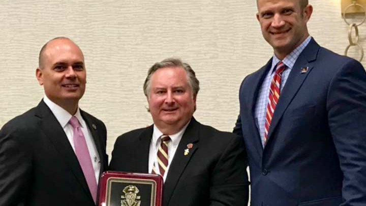 Mark Reavis receiving award