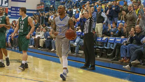 Brandon Roberts celebrates at the end of a recent UAH men's basketball victory. ?>