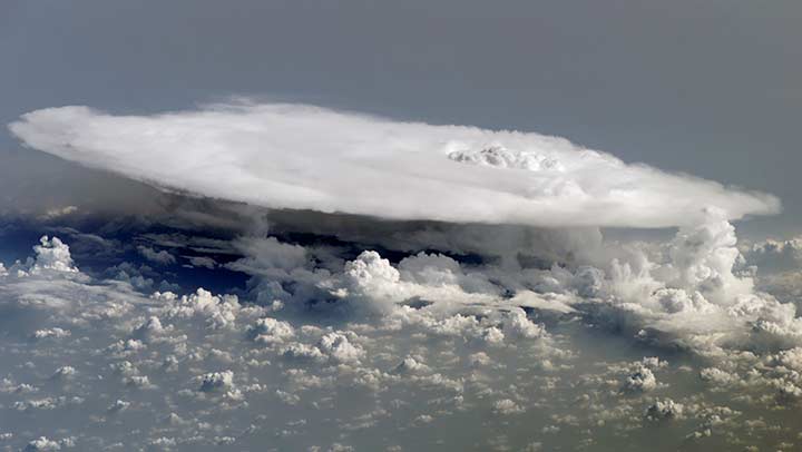 in-atmosphere photo of large cloud forming