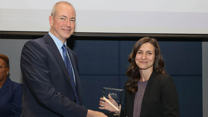 JDean Jason Greene, College of Business, presents Outstanding Faculty Award to Dr. Natalie Malak