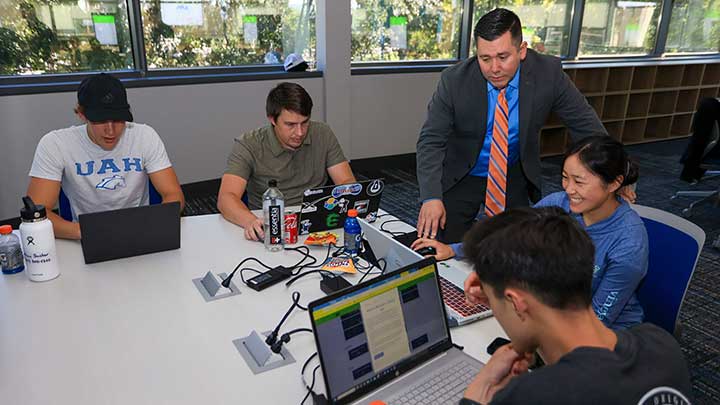 students with laptops