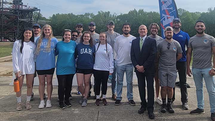 HERCules student team members pose with UAH President, Dr. Charles L. Karr